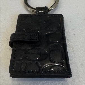 Black coach photo album key chain with pink interior!!! Like new!!